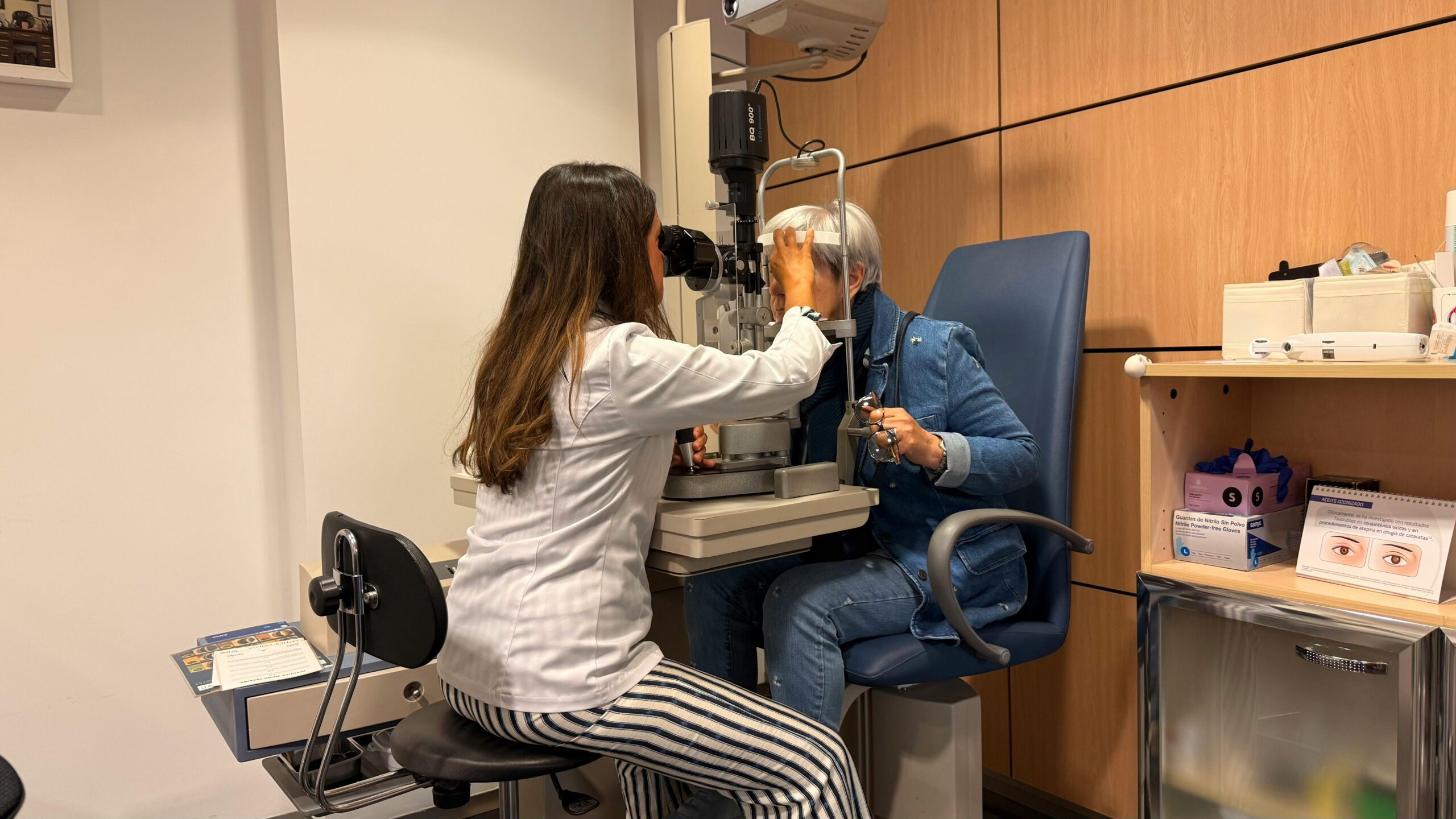 a patient and doctor during an eye exam