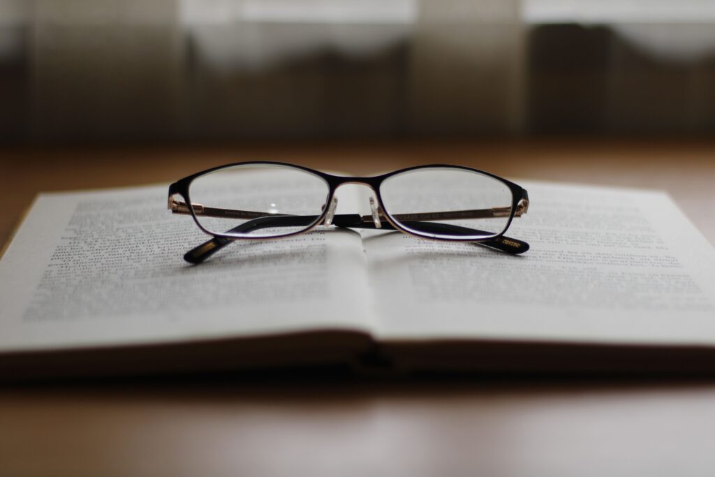 glasses on a book