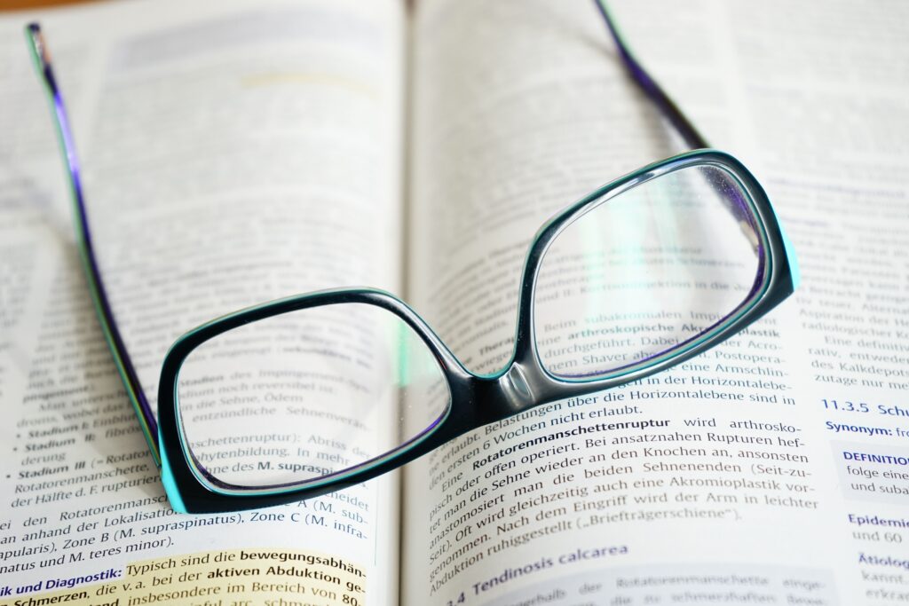 glasses on a book